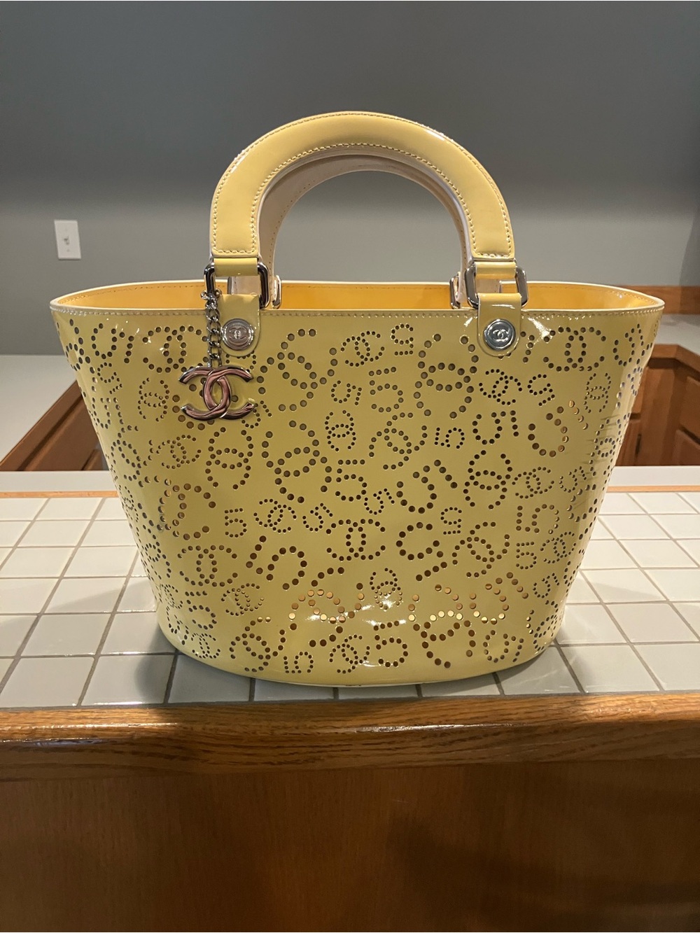 CHANEL Yellow Perforated Patent Leather Top-Handle Tote with CC Charm